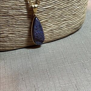 Kingsley Armelle’s Elegant Blue Teardrop Pendant Necklace